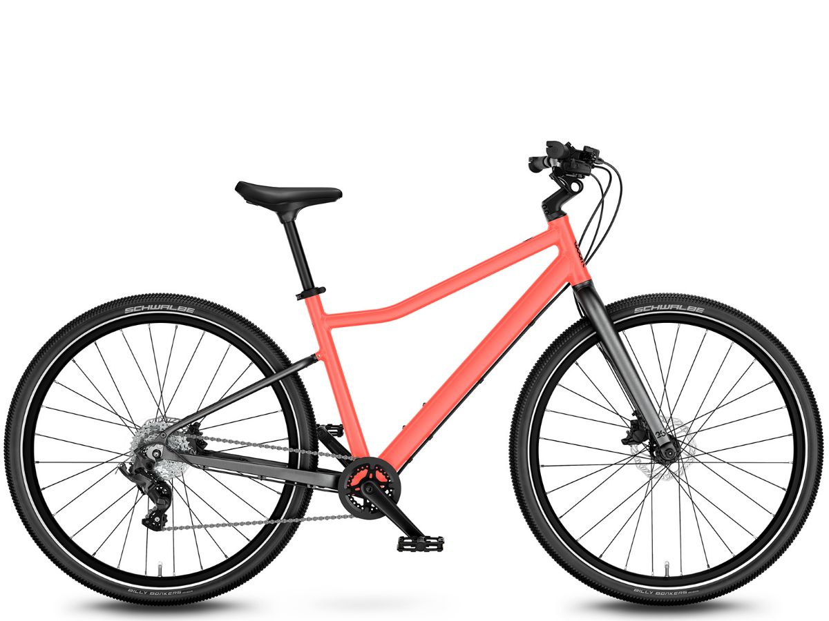 Woom Explore 6 har 8 gir, skivebremser og terrengdekk. Robust sykkel for barn 10–14 år (140–165 cm).