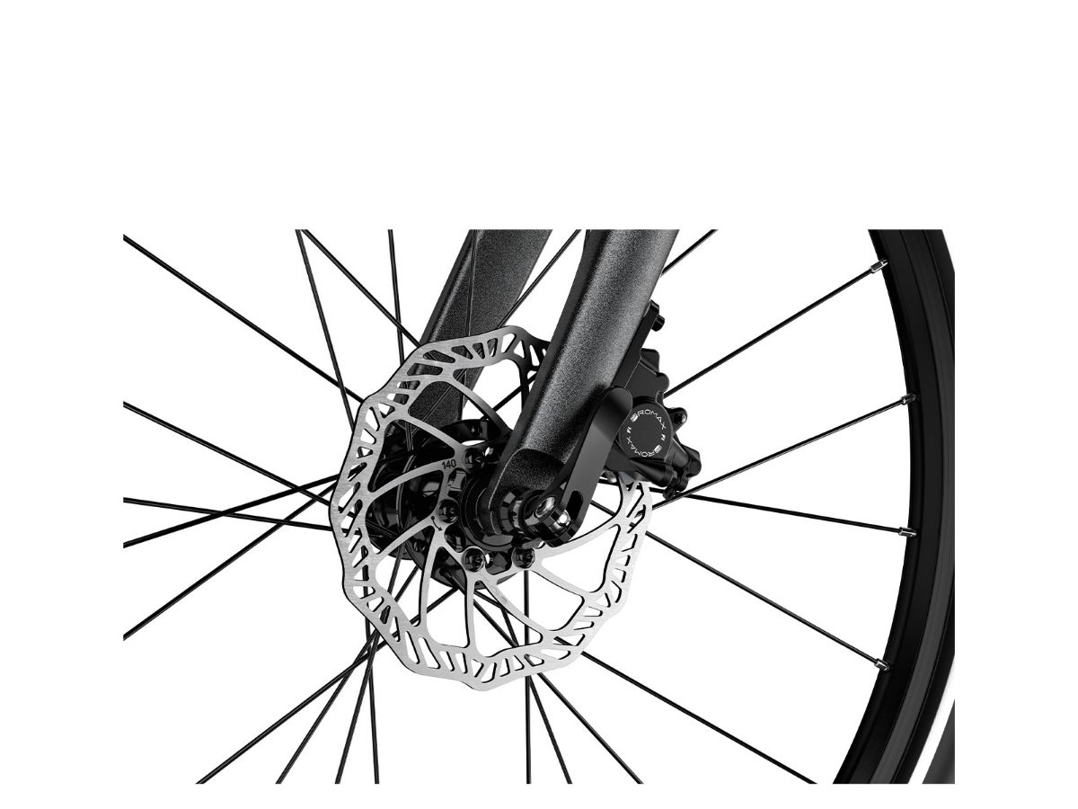 Woom Explore 5 har 8 gir, skivebremser og terrengdekk. Robust sykkel for barn 7–11 år (125–145 cm).