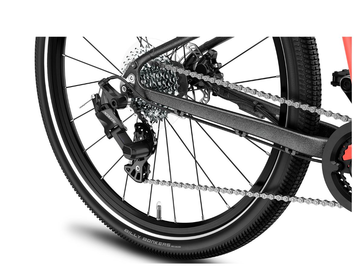 Woom Explore 5 har 8 gir, skivebremser og terrengdekk. Robust sykkel for barn 7–11 år (125–145 cm).