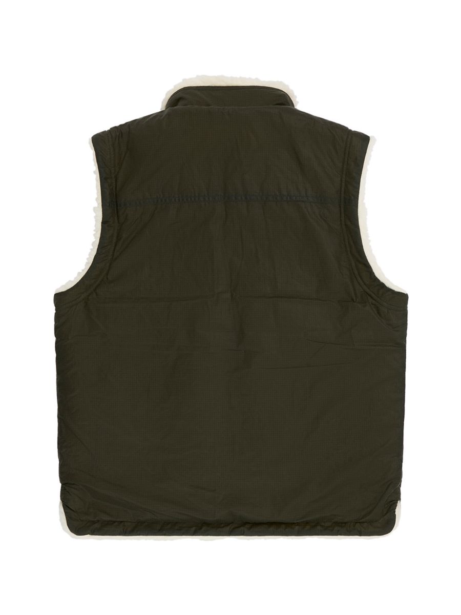 Harvester Reverso Waxed Vest fra Amundsen som kan brukes to veier! Unisex og i fargen Olive