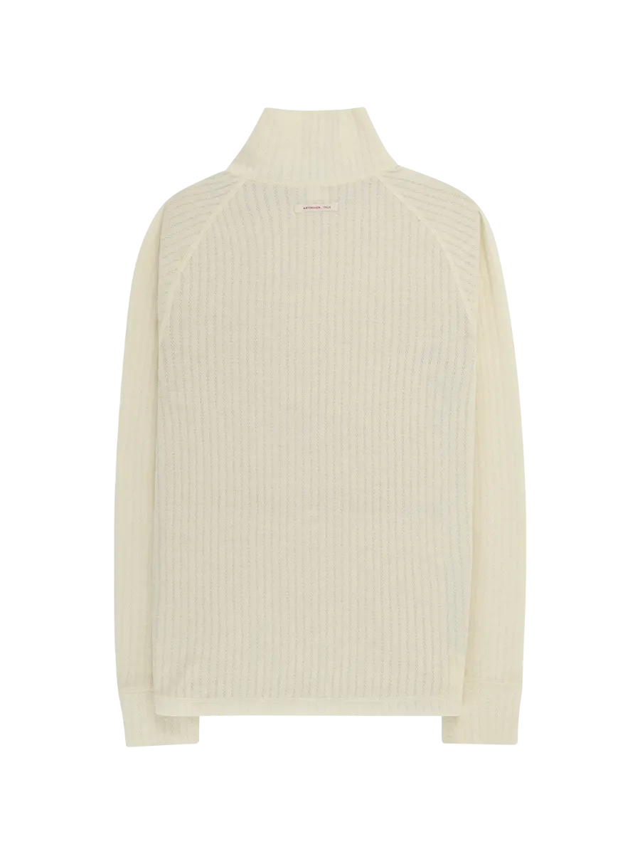 Amundsen Hero's Hide Half Zip Mens i fargen Natural med rød Amundsen Logo. Ulltrøye fra Amundsen til herre med glidelås i halsen
