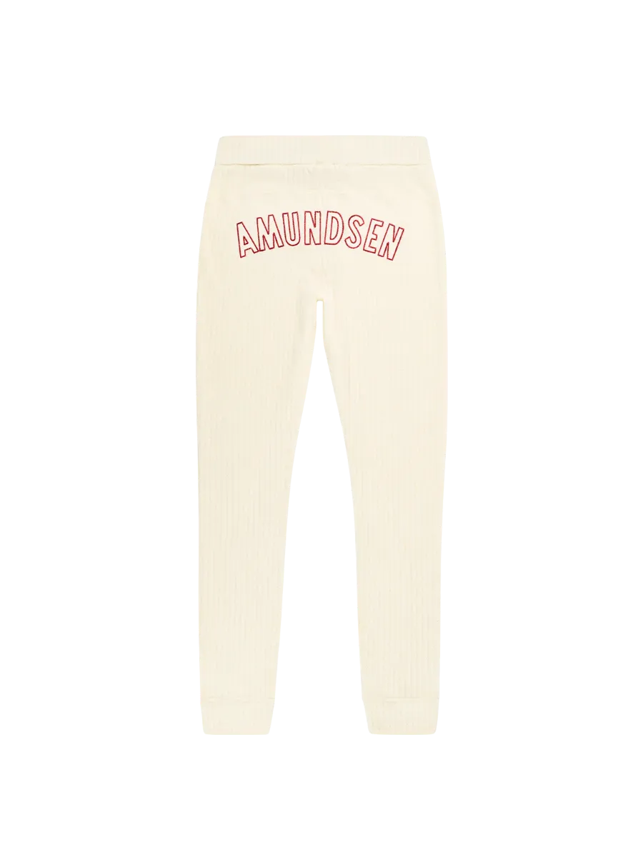 Amundsen Hero's Hide Long Janes i fargen Natural med en stor Amundsen Logo på rumpa. Ullongs fra Amundsen til dame med logo