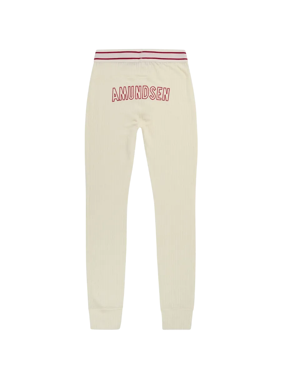 Amundsen Hero's Hide Long Johns i fargen Natural med en stor Amundsen Logo på rumpa. Ullongs fra Amundsen til herre med logo