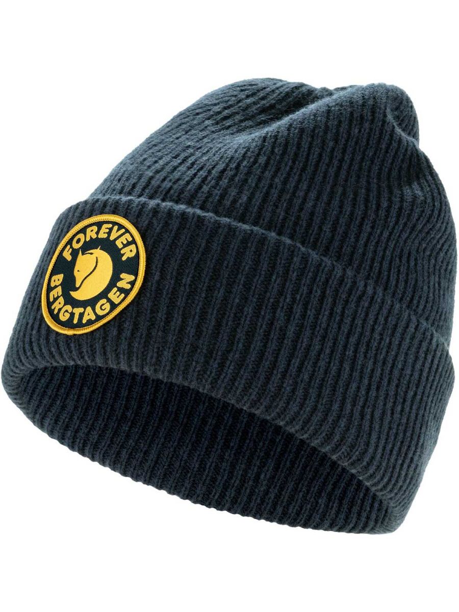 Lue i ribbestrikk fra Fjellraven i fargen dark navy til dame og herre