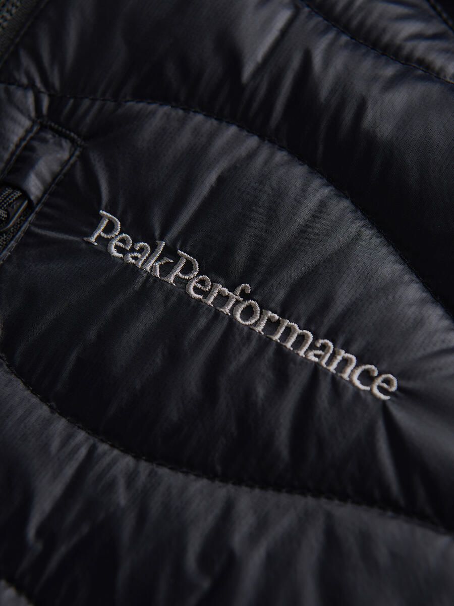 Bilde av Peak Performance  W Helium Down Hybrid Hood J 050 Black