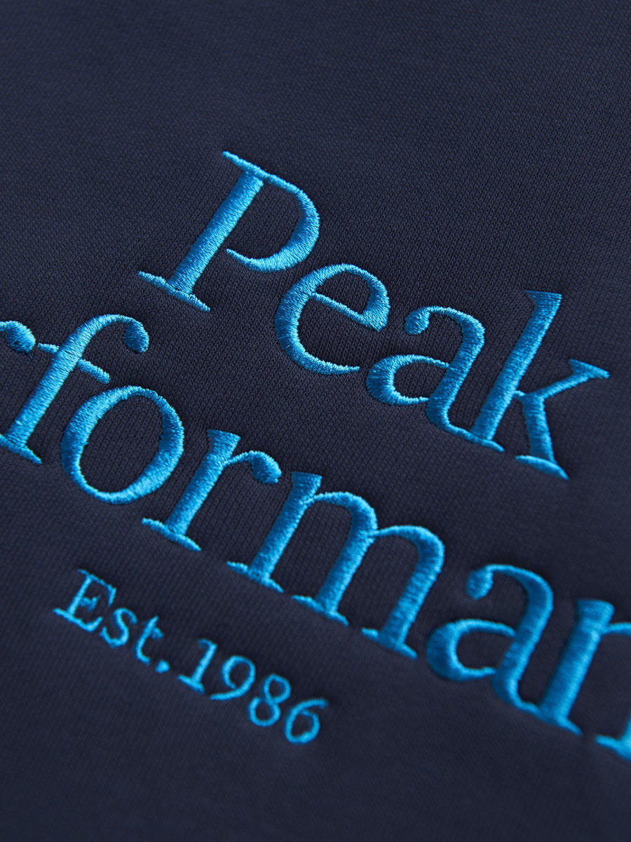Bilde av Peak Performance  M Original Hood 0130 Blue Shadow (turkis logo)
